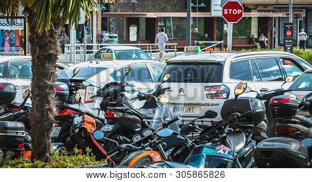 Motorcycle And Taxis Parking Near Town Hall In Irun, Spain