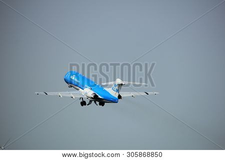 Amsterdam, The Netherlands  -  June 2nd, 2017: Ph-kzm Klm Cityhopper Fokker F70 Taking Off From Pold