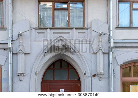 Moscow - October 27, 2018: High Relief Of An Eagle Above The Entrance Of The Former Apartment Buildi