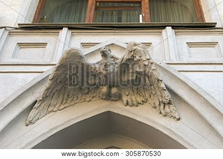 Moscow - October 27, 2018: High Relief Of An Eagle Above The Entrance Of The Former Apartment Buildi