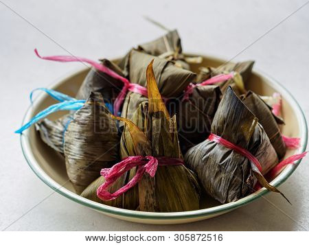 High Angle Shot Of Steamed Asian Rice Dumplings (zongzi), A Traditional Food Eaten During Dragon Boa