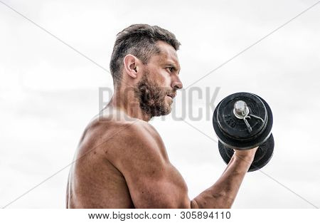 Man Sportsman With Strong Hands. Steroids. Athletic Body. Dumbbell Gym. Fitness And Sport. Muscular 
