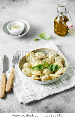 Meat Dumplings - Russian Pelmeni, Ravioli With Meat On A White Plate.
