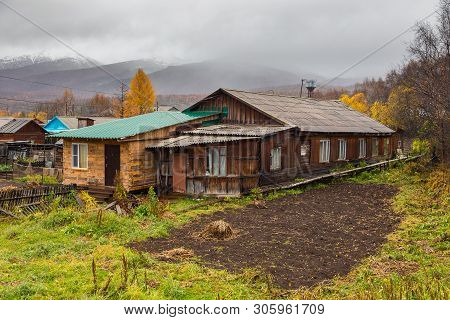Esso, Kamchatka Peninsula, Russia- 02 October 2014: Housing Estate Of Small Wooden Houses In A Small