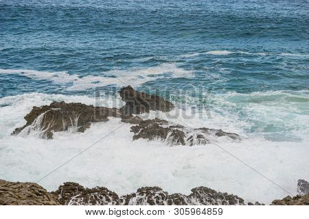 raging and furious sea breaking against the rocks, Cantabrian Sea in the North of Spain