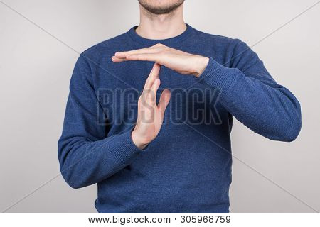 Cropped Close Up Photo Shot Of Satisfied Angry Ceo Chief Making Giving Time Out Signal To His Traine
