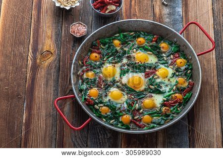 Turkish Cuisine Spinach With Fried Eggs Or Ispanak Yumurta, Copy Space