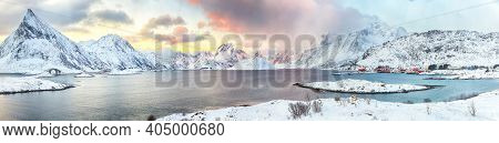Picturesque Morning View Of Torsfjorden Fjord With Fredvang Cantilever Bridge And Village At Sunrise