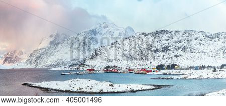 Picturesque Morning View Of Torsfjorden Fjord With Fredvang  Village And Snowy Mountain Peaks At Bac