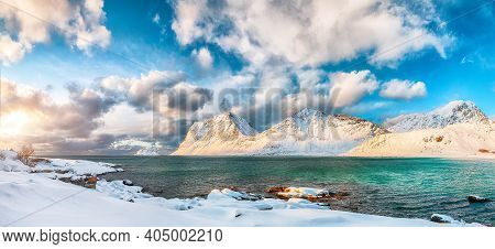 Stunning Winter View Of Vik Beach During Sunset With Lots Of Snow  And Snowy  Mountain Peaks Near Le