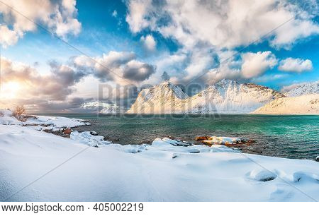 Stunning Winter View Of Vik Beach During Sunset With Lots Of Snow  And Snowy  Mountain Peaks Near Le