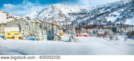 Fabulous Winter Scenery With Traditional Norwegian Wooden Houses And Pine Trees Near Valberg Village