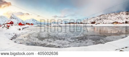 Stunning Morning View Of Torsfjorden Fjord With Fredvang  Village And Snowy Mountain Peaks At Backgr