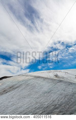 View On Icy Glacier Near Winter And Summer Sky Station Les Deux Alpes In Summer