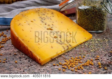 Cheese Collection, Piece Of Hard Yellow Dutch Gouda Cheese With Dried Caraway Or Cumin Seeds