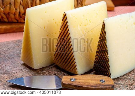 Cheese Collection, Pieces Of Hard Spanish Manchego Curado, Viejo And Iberico Cheeses Close Up