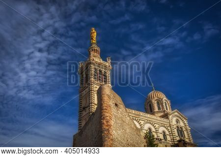 Marseille, France, Oct 2020, close up of Notre-Dame de la Garde, or “la bonne mère”, a Catholic basilica on top of the hill known as La Garde