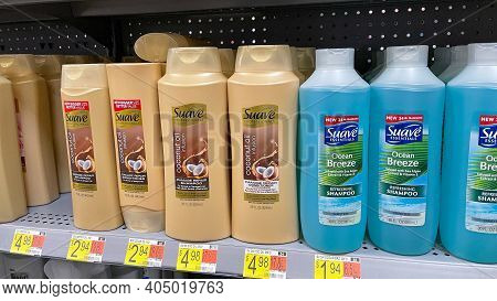 Suave Brand Shampoo And Conditioner  Bottles On A Shelf At Walmart.