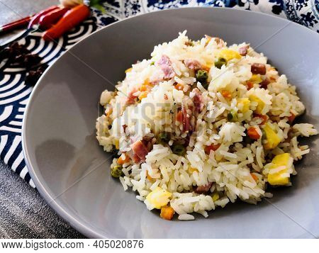 Cantonese fried basmati rice with ham and eggs