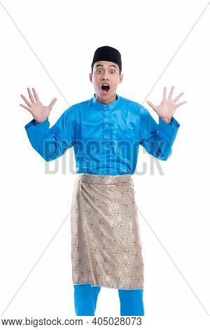 Shocked Man Looking At Camera Over White