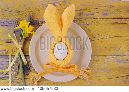 Happy Easter Concept.easter Holiday Table Setting With Cutlery On Barn Boards.narcissus, Rubbit From