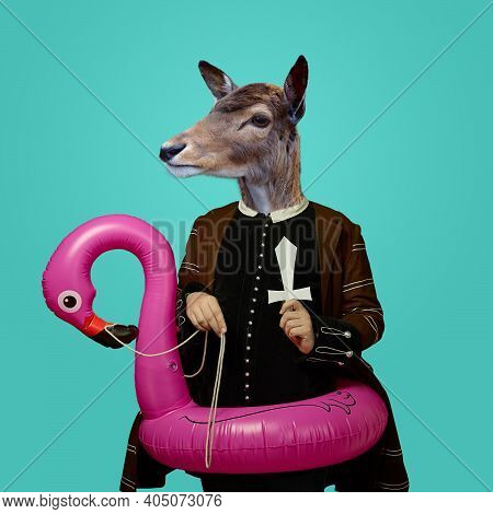 Warrior. Model Like Medieval Royalty Person In Vintage Clothing Headed By Deer Head On Blue Backgrou