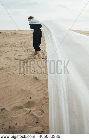 Human Trafficking. Female Slavery. Forced Labour. Back View Of Tired Exhausted Weak Woman Hostage In