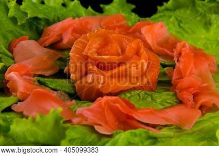 Sashimi Syake With Salmon Slices Arranged In Form Of Rose, Lemon Slices, Wasabi And Lettuce Leaves O