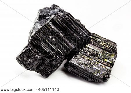 Extreme Close-up Of Black Tourmaline Mineral Isolated Over White Background
