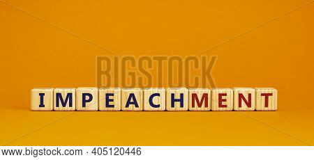Impeachment Symbol. Wooden Cubes With The Word 'impeachment'. Beautiful Orange Background, Copy Spac
