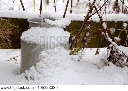 Winter. Aluminum Milk Container In The Snow. Milk Can In The Snow.