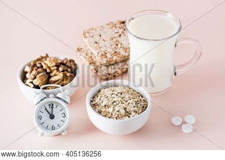 Good Sleep. Foods For Good Sleep - Milk, Walnuts, Crispbread, Oatmeal, Sleping Pill And Alarm Clock 