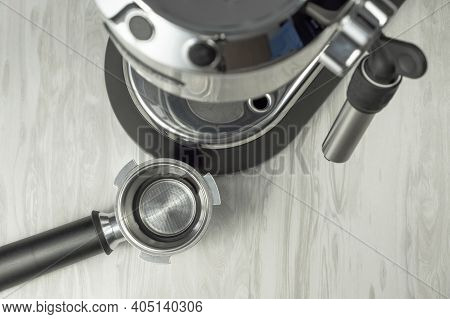 Morning Coffee Ritual. Top View Of Empty Coffee Maker Portafilter Before Making Espresso Coffee.