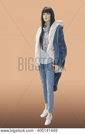 Full Length Female Mannequin Dressed In Warm Fashionable Clothes, Isolated. No Brand Names Or Copyri