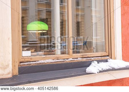 Finland, Helsinki. January 26, 2021 Windows And Facade Of An Old Building In Helsinki. Close-up. Hig