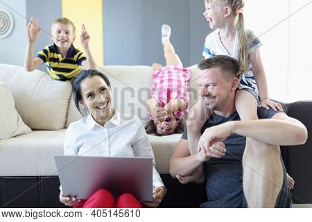 Family With Children Spend Their Home Time In Quarantine. Home Games With Children Concept