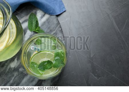 Delicious Lemonade Made With Soda Water And Fresh Mint On Grey Table, Flat Lay. Space For Text