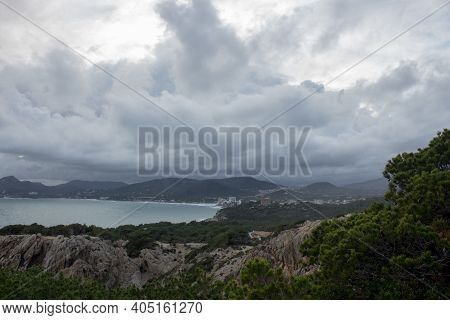 View To The Bay Of Cala Ratjada, Majorca, Spain. Stormy Clouds And Sea.