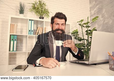 Reception Room. Respectable Ceo. Man Handsome Boss Sit In Office Drinking Coffee. Comfy Workspace. B