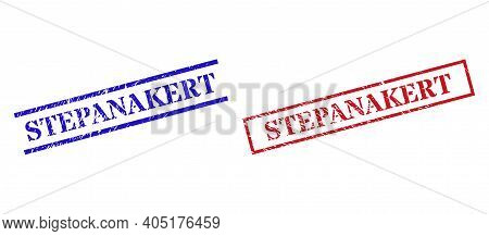 Grunge Stepanakert Rubber Stamps In Red And Blue Colors. Stamps Have Rubber Surface. Vector Rubber I