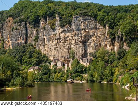 La Roque-gageac, Dordogne, France - September 7, 2018: Canoeing And Tourist Boat, In French Called G