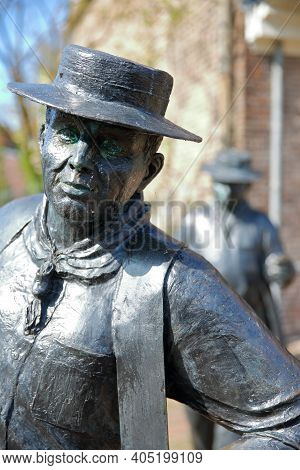 Edam, Netherlands - September 17, 2020: Close-up On The Statues Of Cheese Carriers (sculptor Jans Va
