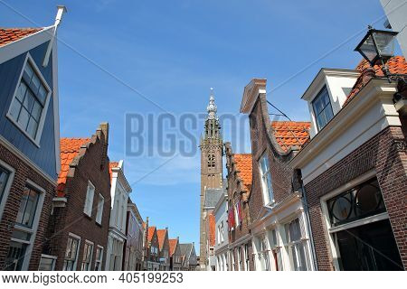 Colorful Facades Of Historic Houses In Edam, North Holland, Netherlands, With The Speeltoren (carill