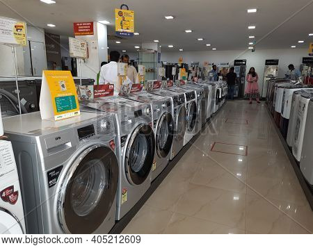 Closeup Of New Washing Machine, Mobile, Steamed Iron Box In A Girias Electronics Showroom At Gokul E