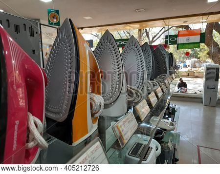 Closeup Of New Washing Machine, Mobile, Steamed Iron Box In A Girias Electronics Showroom At Gokul E