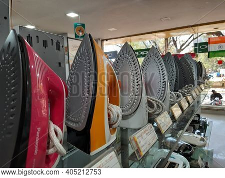 Closeup Of New Washing Machine, Mobile, Steamed Iron Box In A Girias Electronics Showroom At Gokul E