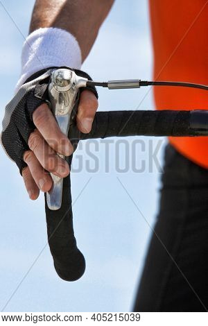 Man With His Hand on His Bcycle's Brake