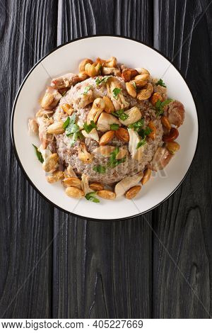 Lebanese Chicken And Rice Riz Bi-djaj Closeup In The Plate. Vertical Top View