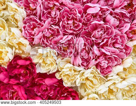 Closeup Of The Colorful Artificial Flowers From The Fabric, On The Wall Of The Shopping Mall For Dec
