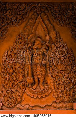 Ganesha On The Walls Of A Buddhist Temple On Koh Samui. Wat Ratchathammaram, One Of The Iconic Templ